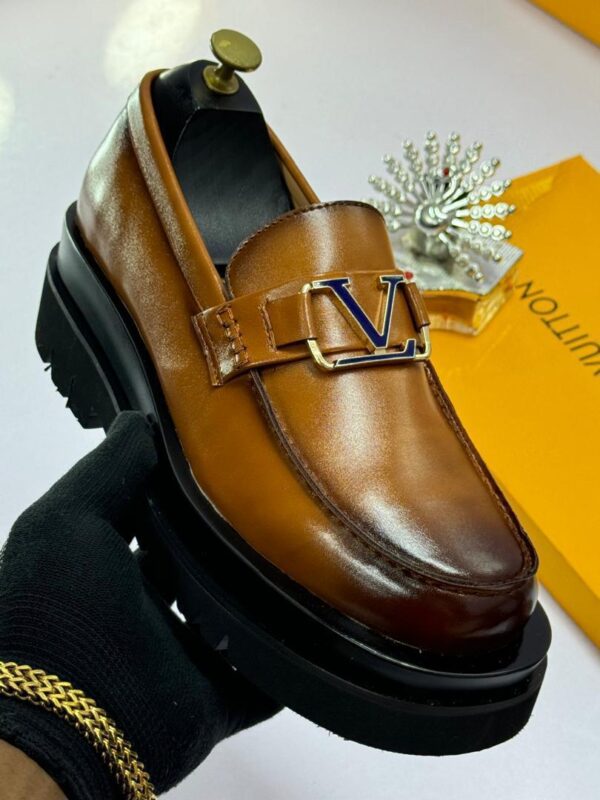 Louis Vuitton Men's Wingtip Louis Vuitton Buckle Shoe | KinetixLuxury Nigeria