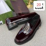 Burgundy Patent Leather Loafers With Interlocking Metal Emblem