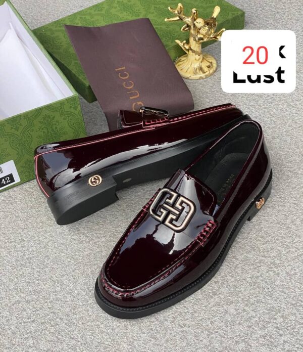 Burgundy Patent Leather Loafers With Interlocking Metal Emblem